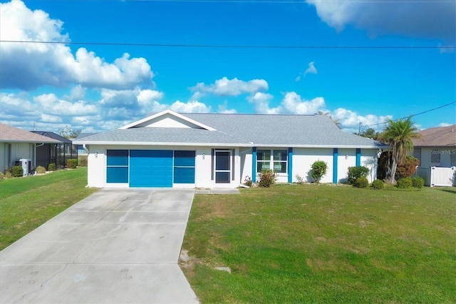 ranch-style home with a front lawn and a garage