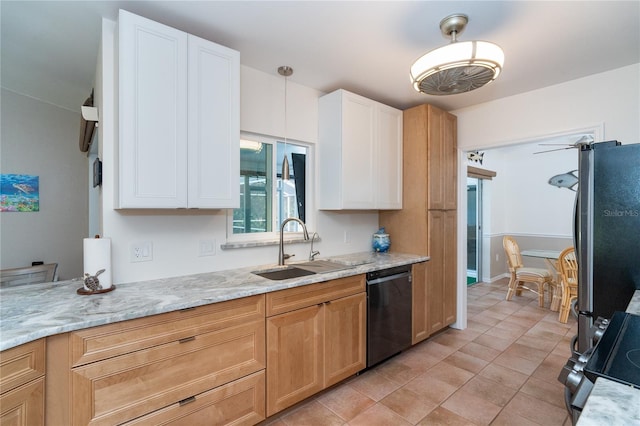 kitchen featuring white cabinetry, sink, hanging light fixtures, stainless steel fridge, and black dishwasher