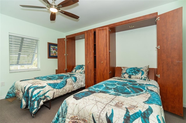 bedroom with ceiling fan and carpet