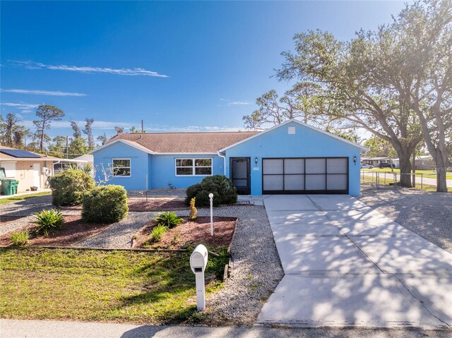 single story home featuring a garage