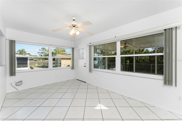 interior space featuring ceiling fan