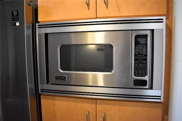 interior details with appliances with stainless steel finishes