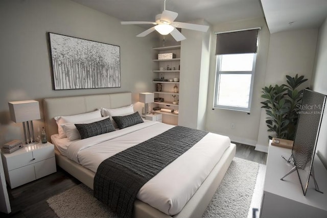 bedroom featuring dark hardwood / wood-style flooring and ceiling fan