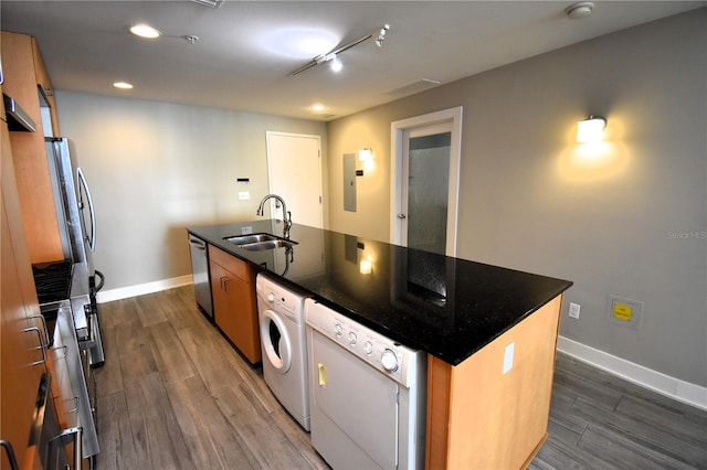 kitchen with a center island with sink, dishwasher, and dark hardwood / wood-style flooring