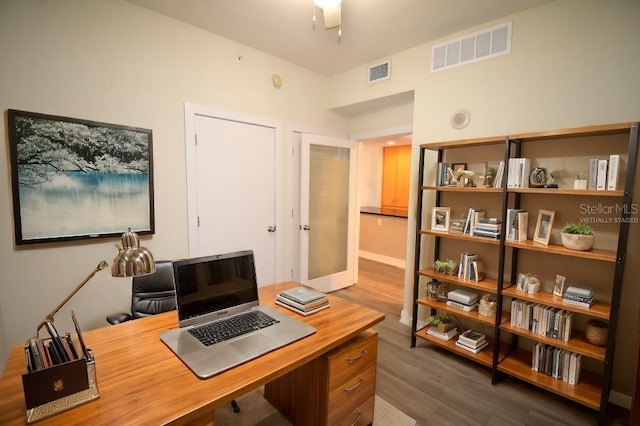 office area featuring hardwood / wood-style flooring and ceiling fan