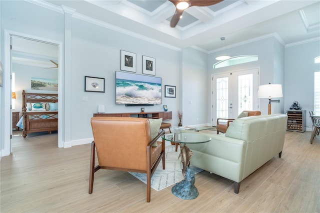 living room featuring french doors, coffered ceiling, light hardwood / wood-style flooring, ceiling fan, and a high ceiling