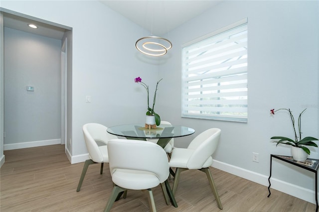 dining space featuring light hardwood / wood-style flooring