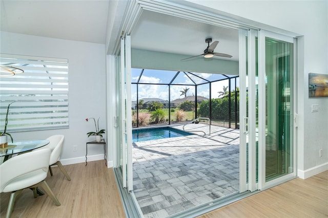 view of pool featuring ceiling fan