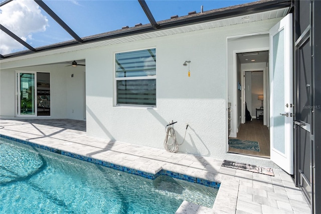 exterior space with a patio area and ceiling fan