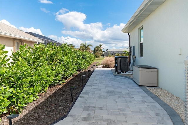 view of patio featuring central AC unit