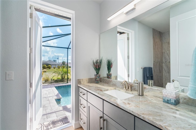 bathroom featuring vanity and a healthy amount of sunlight