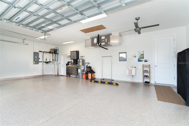 garage featuring electric panel, water heater, and ceiling fan