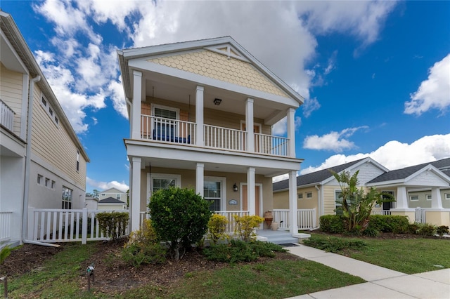 view of front of home with a balcony