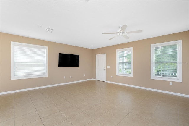 12753 Sagewood Dr, Venice, FL 34293 - empty room featuring ceiling fan and baseboards