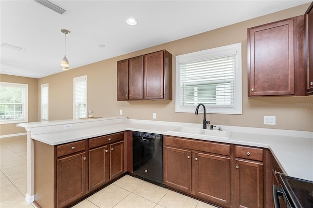 12753 Sagewood Dr, Venice, FL 34293 - kitchen featuring black dishwasher, a peninsula, light tile patterned flooring, range with electric stovetop, and recessed lighting