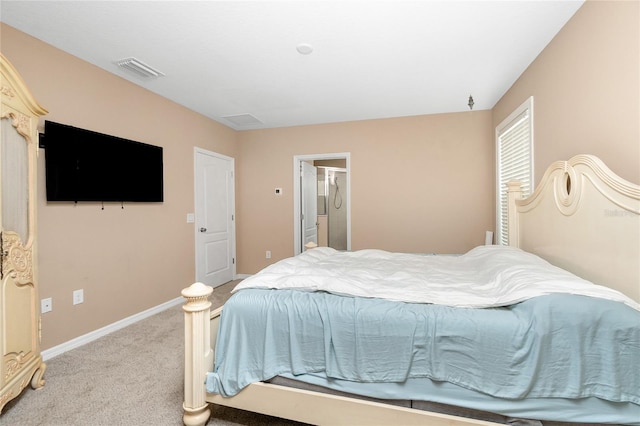 12753 Sagewood Dr, Venice, FL 34293 - bedroom featuring light carpet and baseboards
