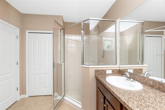 12753 Sagewood Dr, Venice, FL 34293 - bathroom with a stall shower, vanity, and tile patterned floors