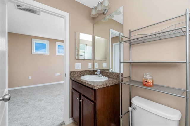12753 Sagewood Dr, Venice, FL 34293 - bathroom with vanity and toilet