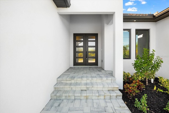 doorway to property with french doors