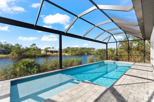 view of pool with a lanai, a water view, and a patio