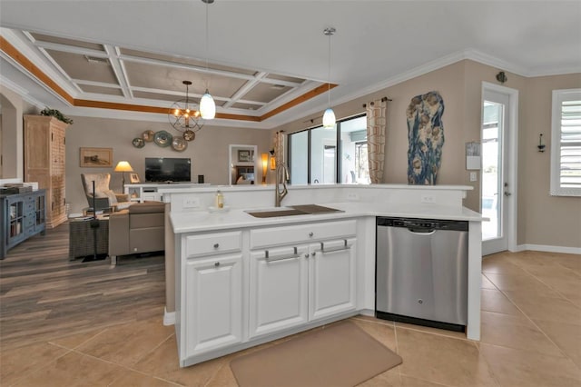 kitchen featuring coffered ceiling, sink, crown molding, decorative light fixtures, and dishwasher