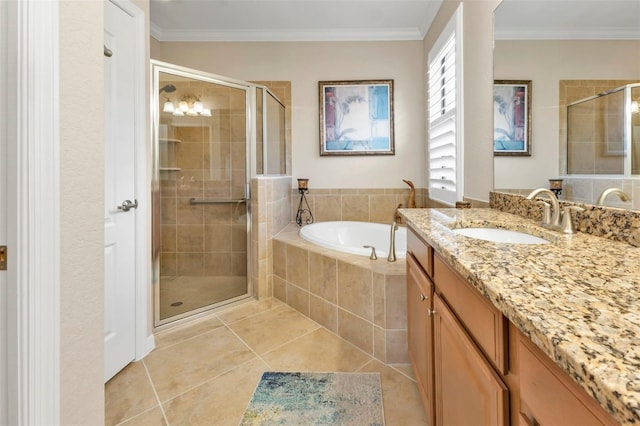 bathroom with vanity, tile patterned flooring, ornamental molding, and shower with separate bathtub