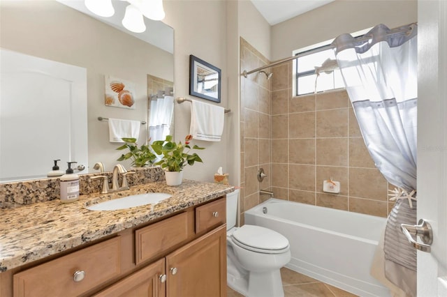 full bathroom featuring shower / tub combo with curtain, vanity, tile patterned flooring, and toilet