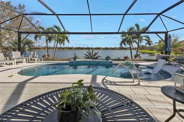 view of swimming pool with a water view, a patio, and glass enclosure