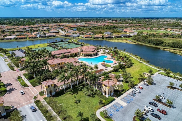 birds eye view of property featuring a water view