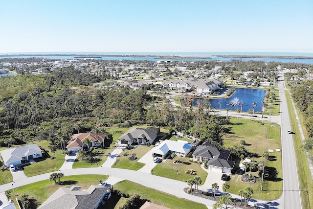 drone / aerial view with a water view