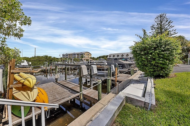 dock area with a water view