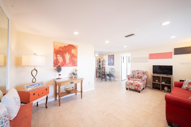42 Caroll Cir, Englewood, FL 34223 - living room featuring recessed lighting and a ceiling fan