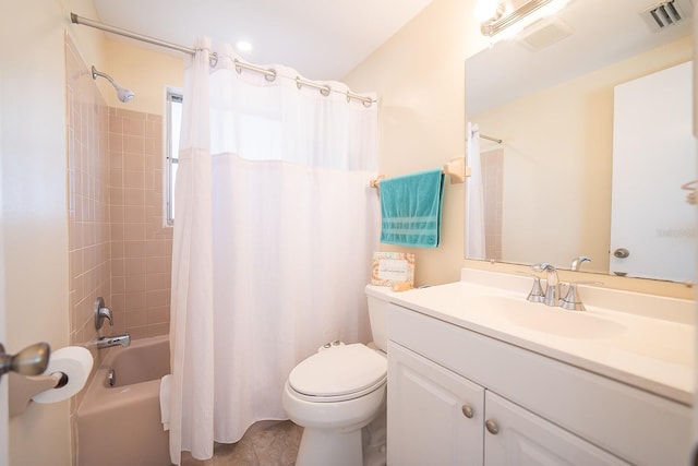 full bathroom with vanity, toilet, and shower / tub combo