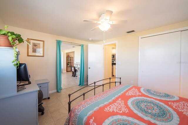 42 Caroll Cir, Englewood, FL 34223 - bedroom featuring a ceiling fan and a closet