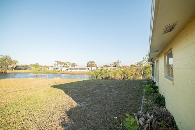 view of yard with a water view