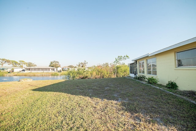 view of yard featuring a water view