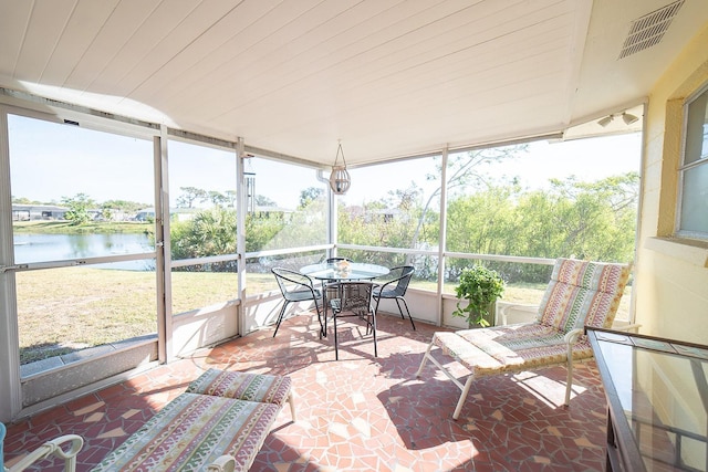 42 Caroll Cir, Englewood, FL 34223 - sunroom / solarium with a water view