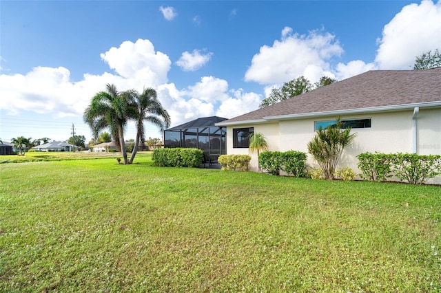 view of yard featuring a lanai