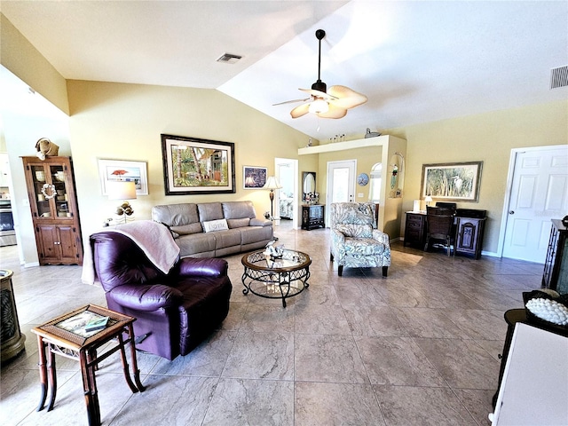 living room with ceiling fan and lofted ceiling