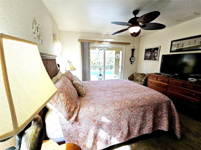 bedroom with access to outside and ceiling fan