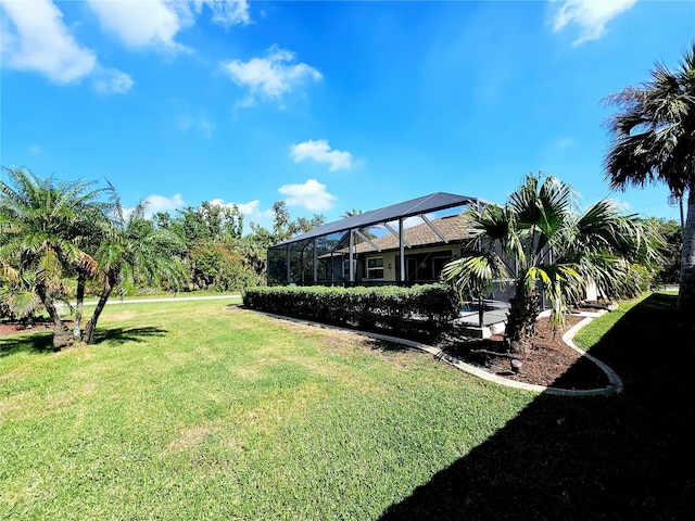 view of yard with a lanai