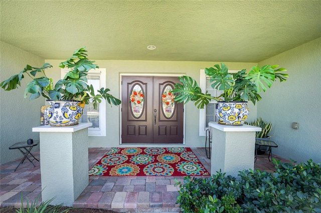 property entrance featuring a porch