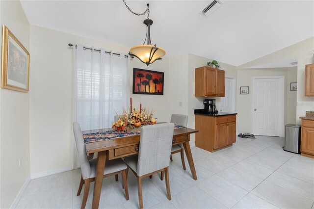 13515 Keystone Blvd, Port Charlotte, FL 33981 - dining area featuring lofted ceiling and baseboards