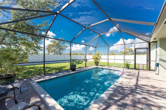 13515 Keystone Blvd, Port Charlotte, FL 33981 - view of swimming pool featuring a patio and glass enclosure