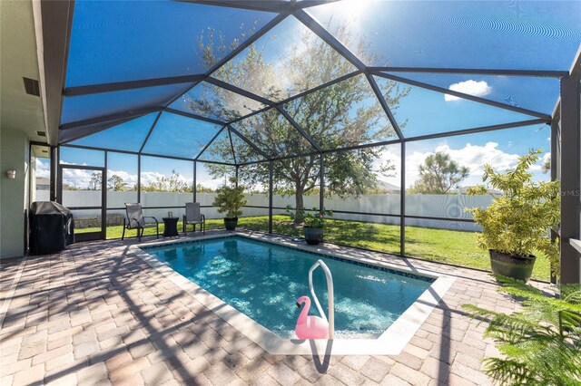 13515 Keystone Blvd, Port Charlotte, FL 33981 - view of swimming pool with a patio, a lanai, and a fenced backyard