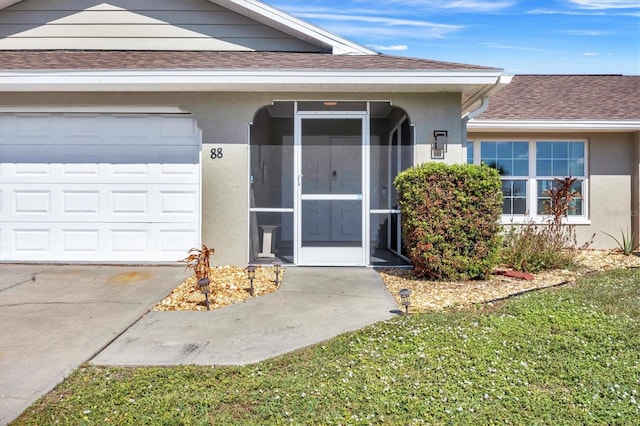 entrance to property featuring a garage