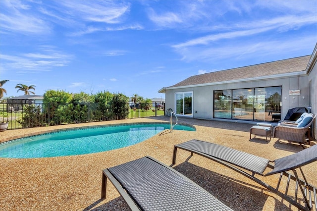 view of pool featuring a patio area