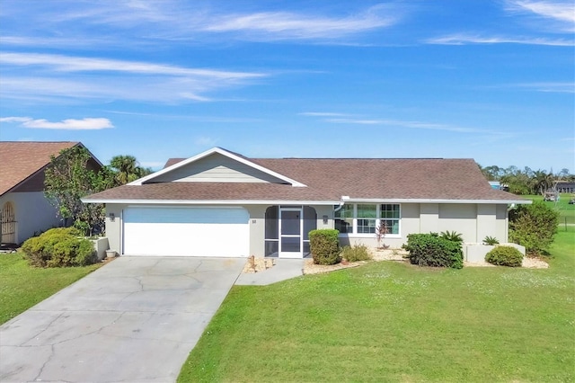 ranch-style house with a garage and a front yard