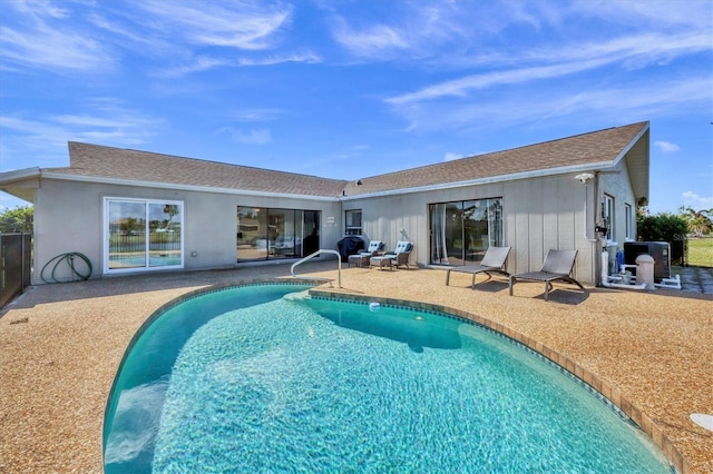 back of house featuring a patio area