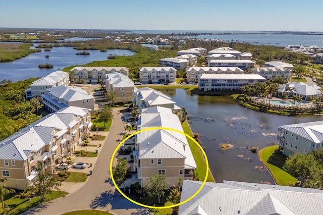 bird's eye view with a water view